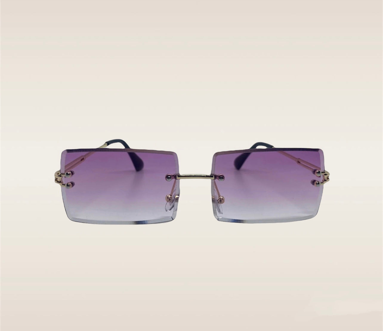 Looking for a modern and stylish pair of glasses? Check out our rectangle rimless frames! Made with high-quality materials, these frames are durable and comfortable to wear. Their sleek and minimalist design complements any outfit, while the rimless style adds a touch of sophistication to your look. The rectangular shape of the frames is flattering on most face shapes, and the absence of rims allows for a more unobstructed view. Whether you need glasses for everyday wear or just for reading, our rectangle rimless frames are the perfect choice. Shop now and discover the perfect blend of style and function with our trendy glasses frames!