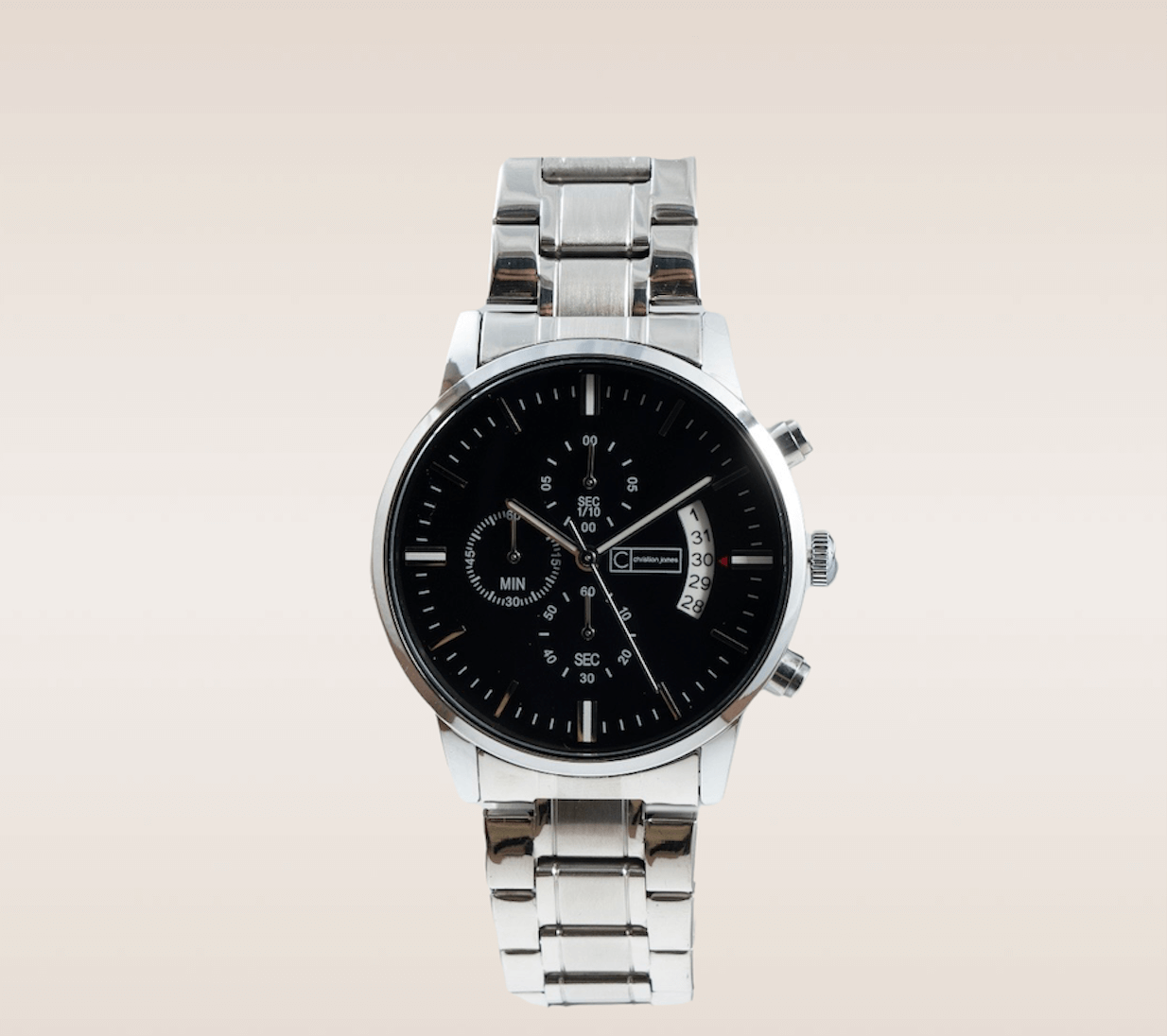 In this up-close shot, we are introduced to the captivating Oynx Timepiece, an embodiment of sleek sophistication and modern aesthetics. The watch features an inky black face that exudes a sense of elegance and mystery. The face is encased in a shining silver casing, creating a striking contrast that commands attention. The clean and minimalistic design of the watch face allows for easy and precise time reading. Complimenting the sleekness, the watch is adorned with a silver link band.