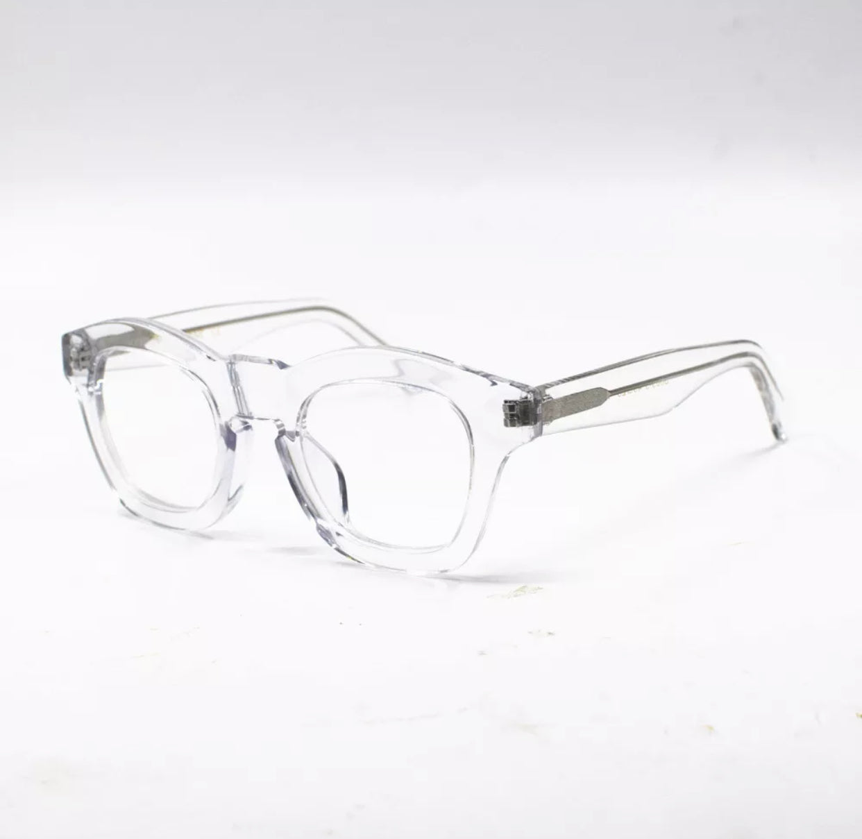 These contemporary glasses feature a unique all transparent frame that showcases a modern and minimalist style. Designed to be lightweight and comfortable, these glasses offer a clear and unobstructed view, allowing you to see the world with clarity and confidence.